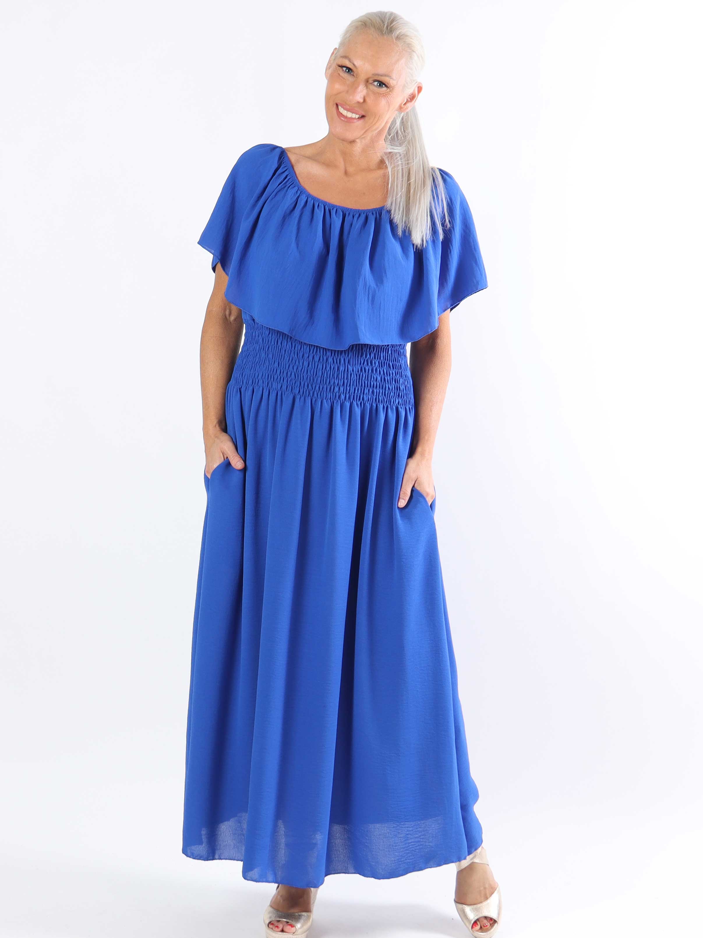 Rachel - Lång plus size-klänning med fickor och volang i nederkanten